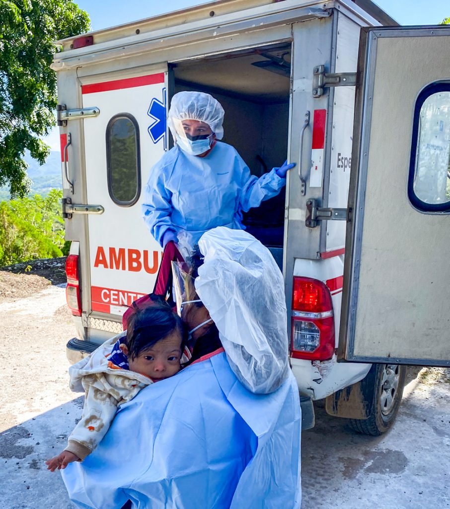 Child rescue team taking Melani to the ambulance