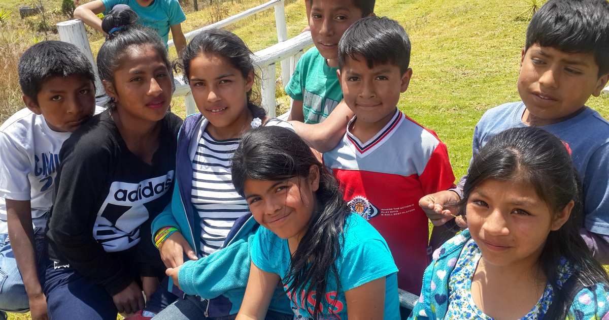 Group of Ecuadorian kids smiling at the camera