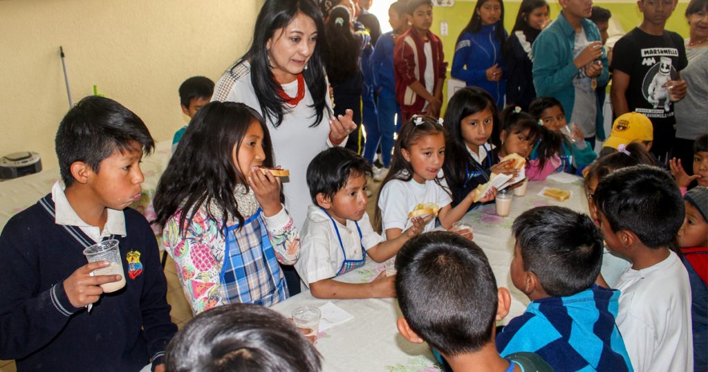 Children receiving a meal in Ecuador