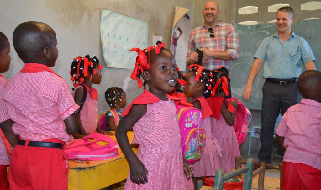 Kelly Miller and Zach Oles Director of International Programs visiting school in Haiti