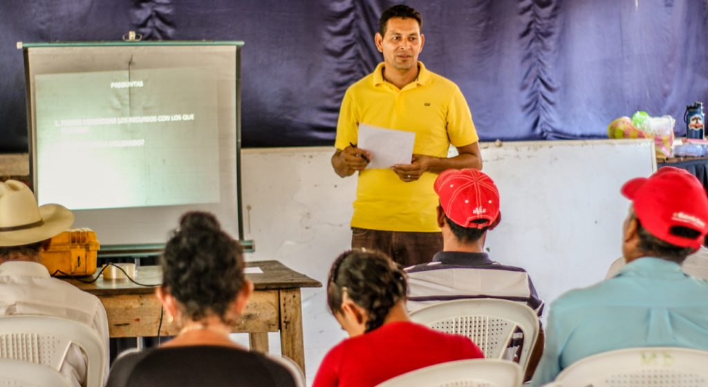 Victorino leading a community development training session