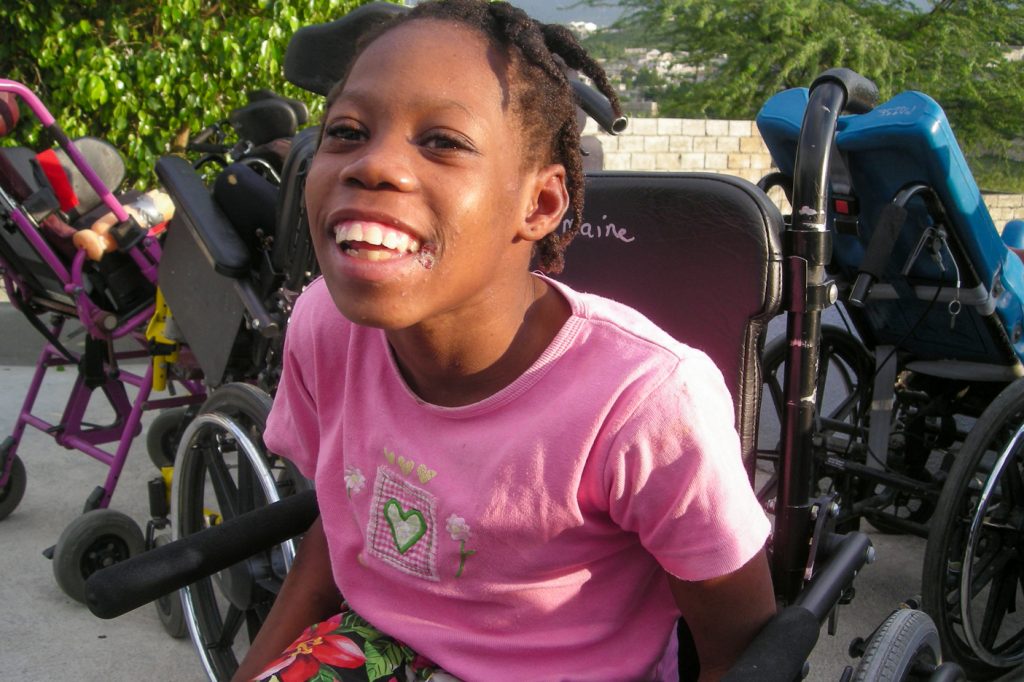 Disabled girl smiling in Haiti