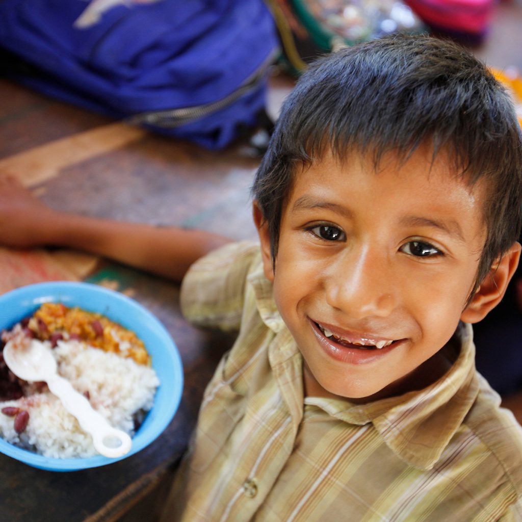 Happy boy at school feeding in Nicaragua