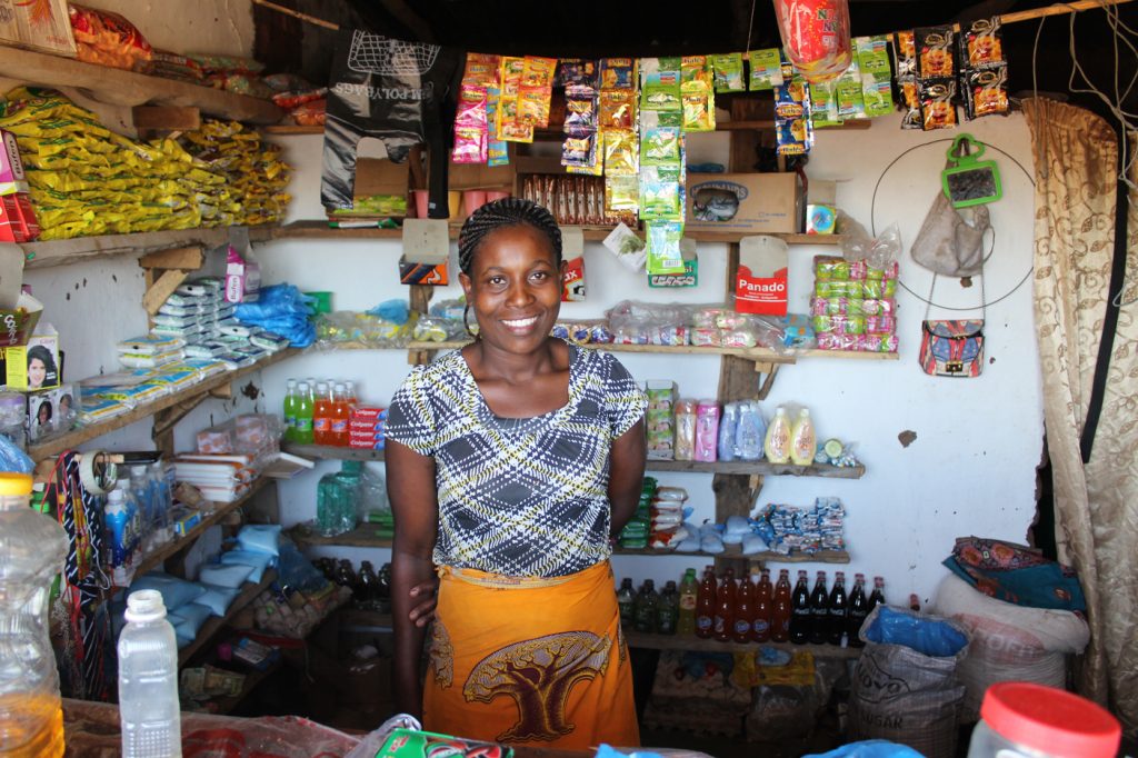 Malawian woman working at her store