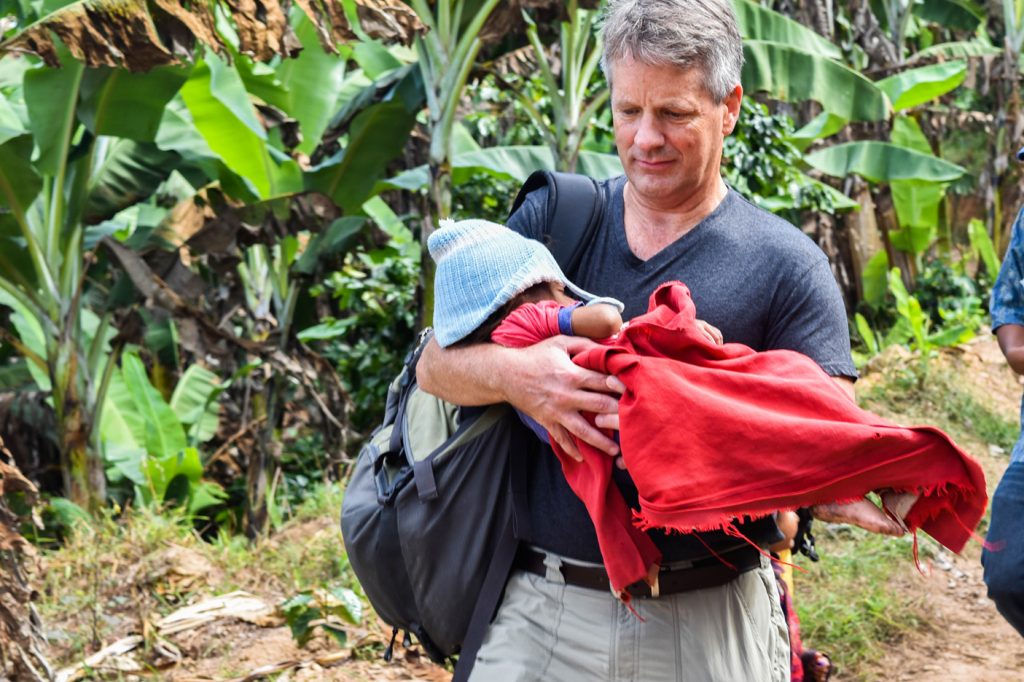 Kelly Miller assisting the rescue of a baby