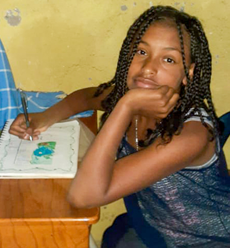 Ecuadorian girl receiving food