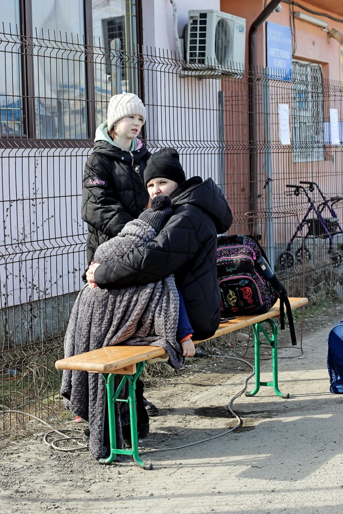 Mother with children waiting to find a way out of Ukraine