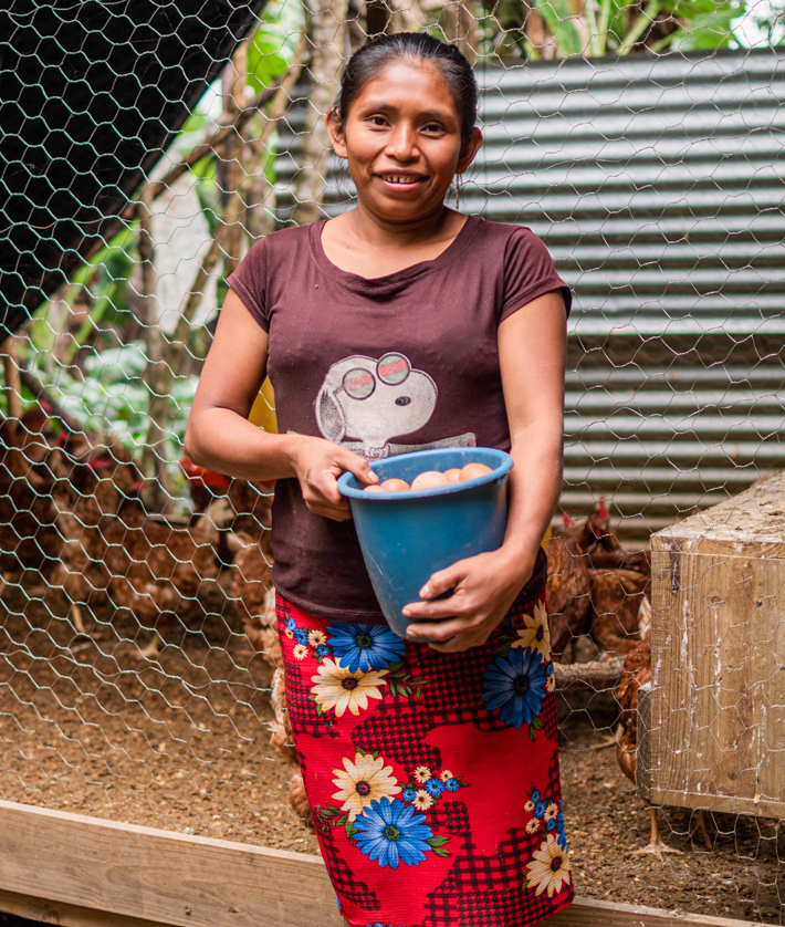 Josefina Garcia showing the eggs produced by her chickens