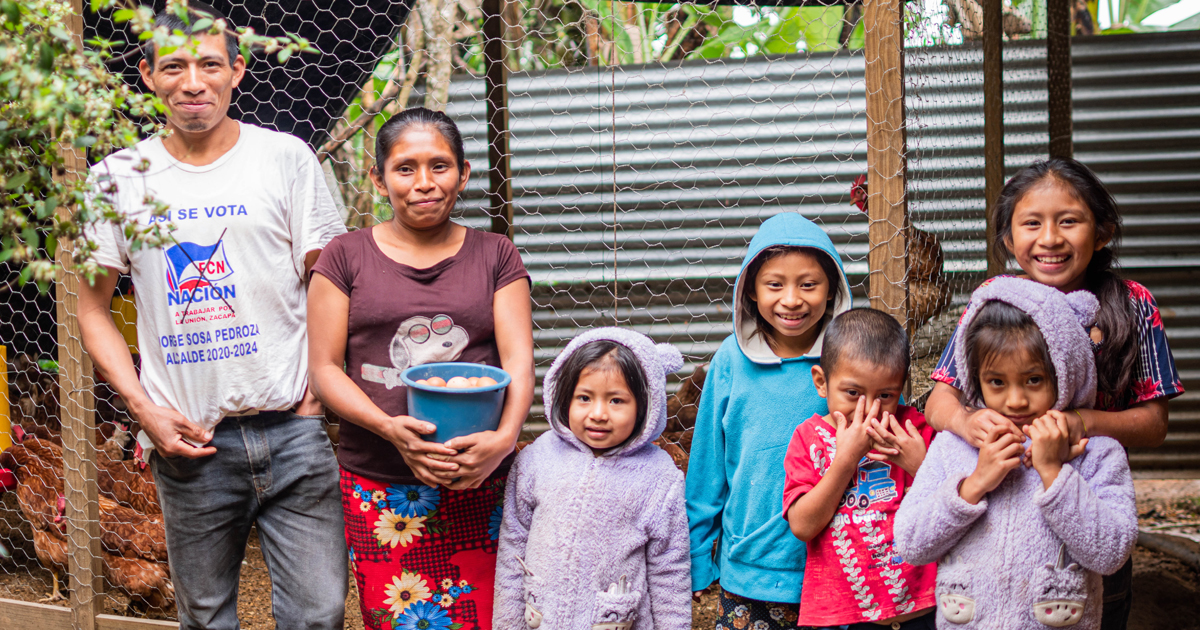 Josefina Garcia and her family proudly showing the product of their labor