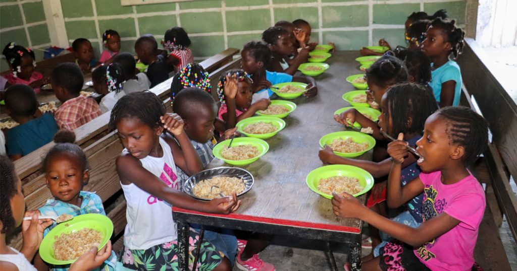 Children receiving lunch at the DSS summer feeding program