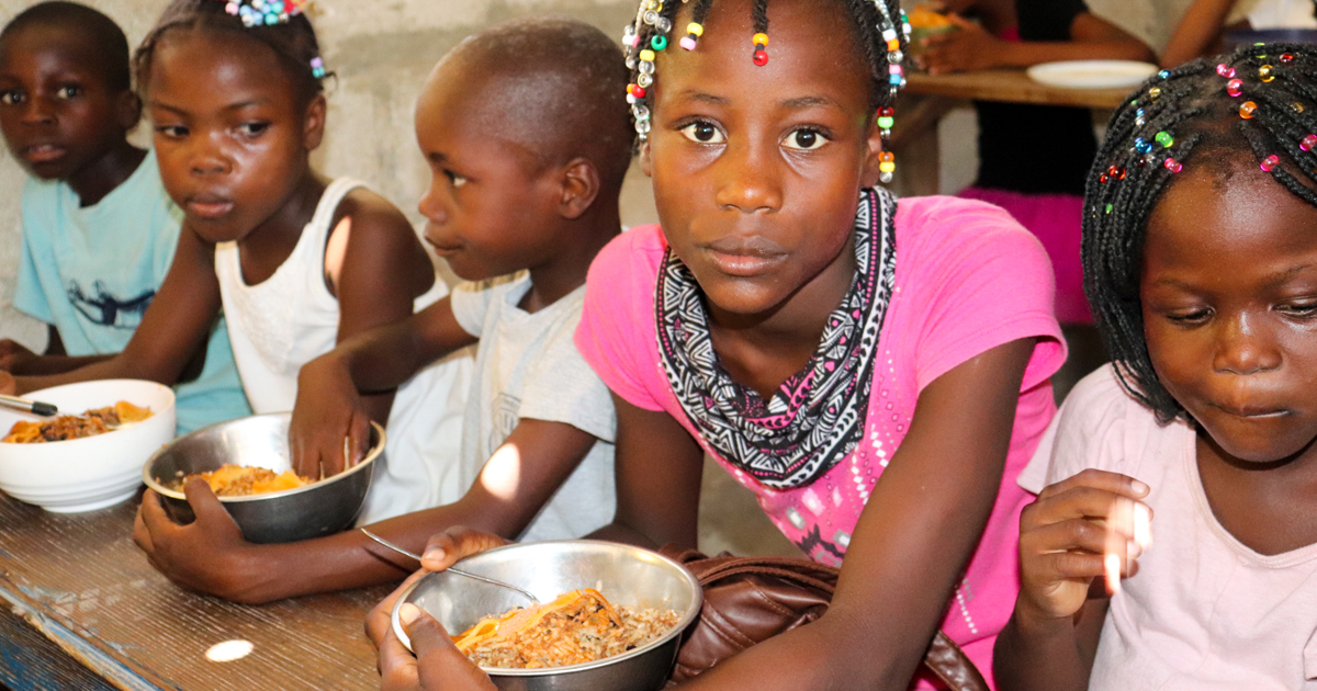Children receiving lunch at the DSS summer feeding program