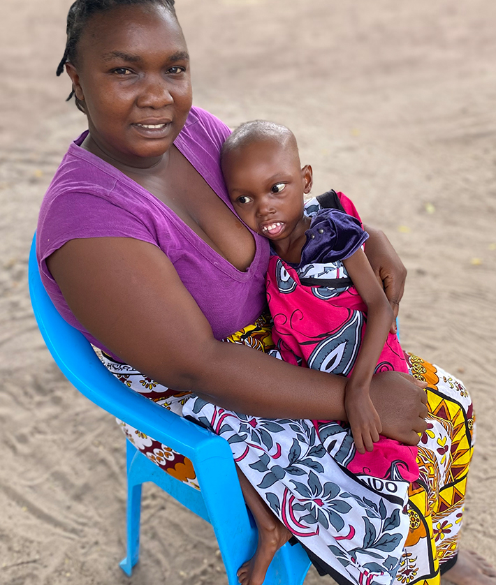 Kenyan mother holding her child