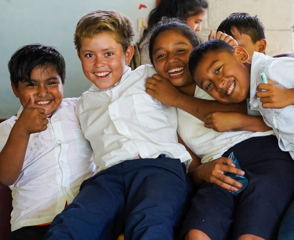 Happy children at food distribution in El Salvador