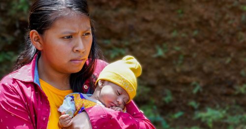 18-year-old Mayra carrying her baby