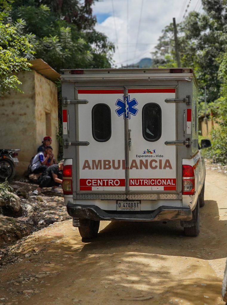 Hope of Life's ambulance going over rural dirt road