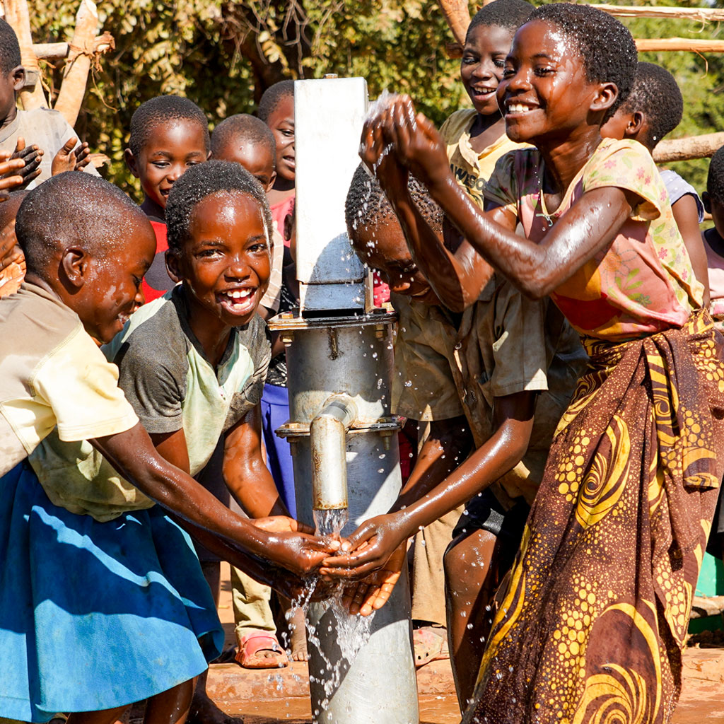 Group of kids from the Agripa Village in Eastern Zambia, celebrating the inauguration of the new water pump.