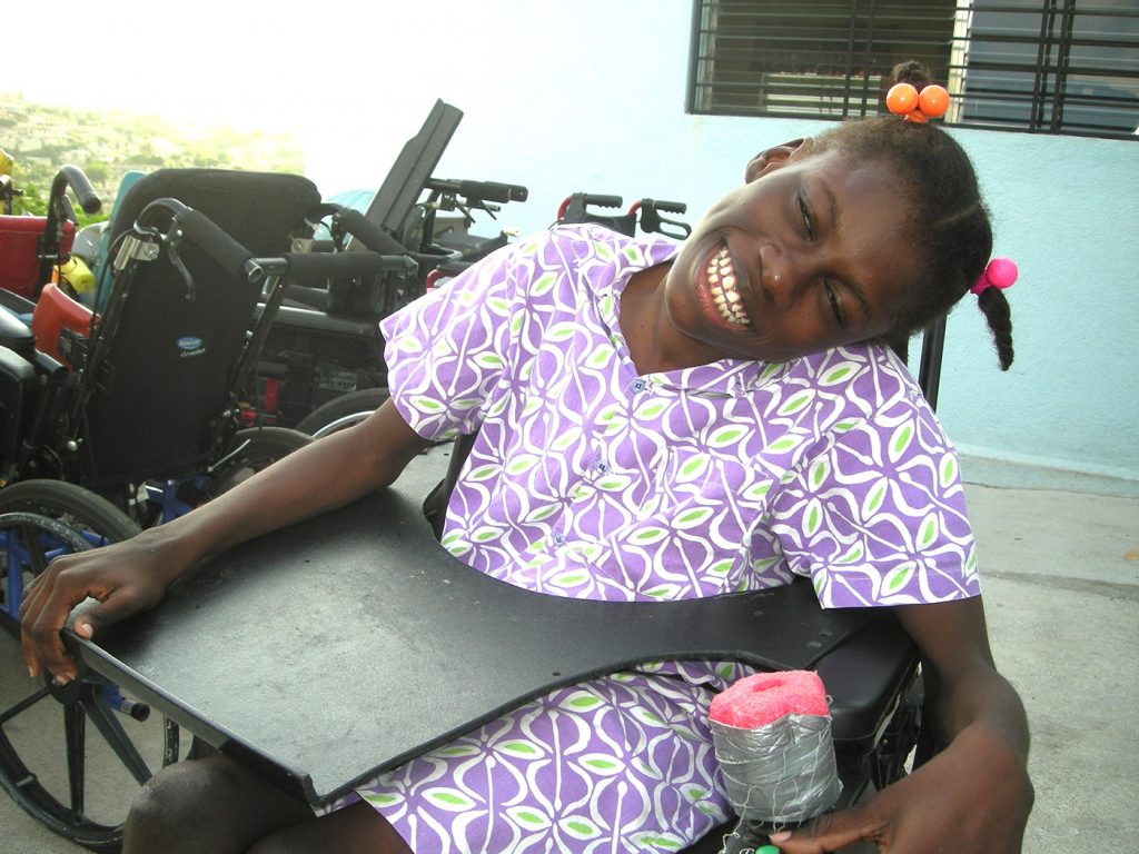 Alta, a child with disabilities, who is helped by Kupenda for the Children.