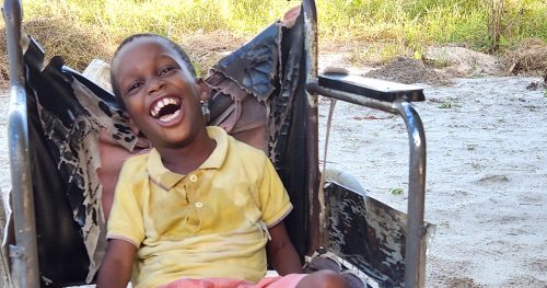 Nine-year-old Emmanuel, who suffers from cerebral palsy, and is one of children with disabilities being helped by Cross International.