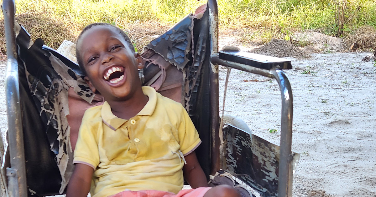 Nine-year-old Emmanuel, who suffers from cerebral palsy, and is one of children with disabilities being helped by Cross International.